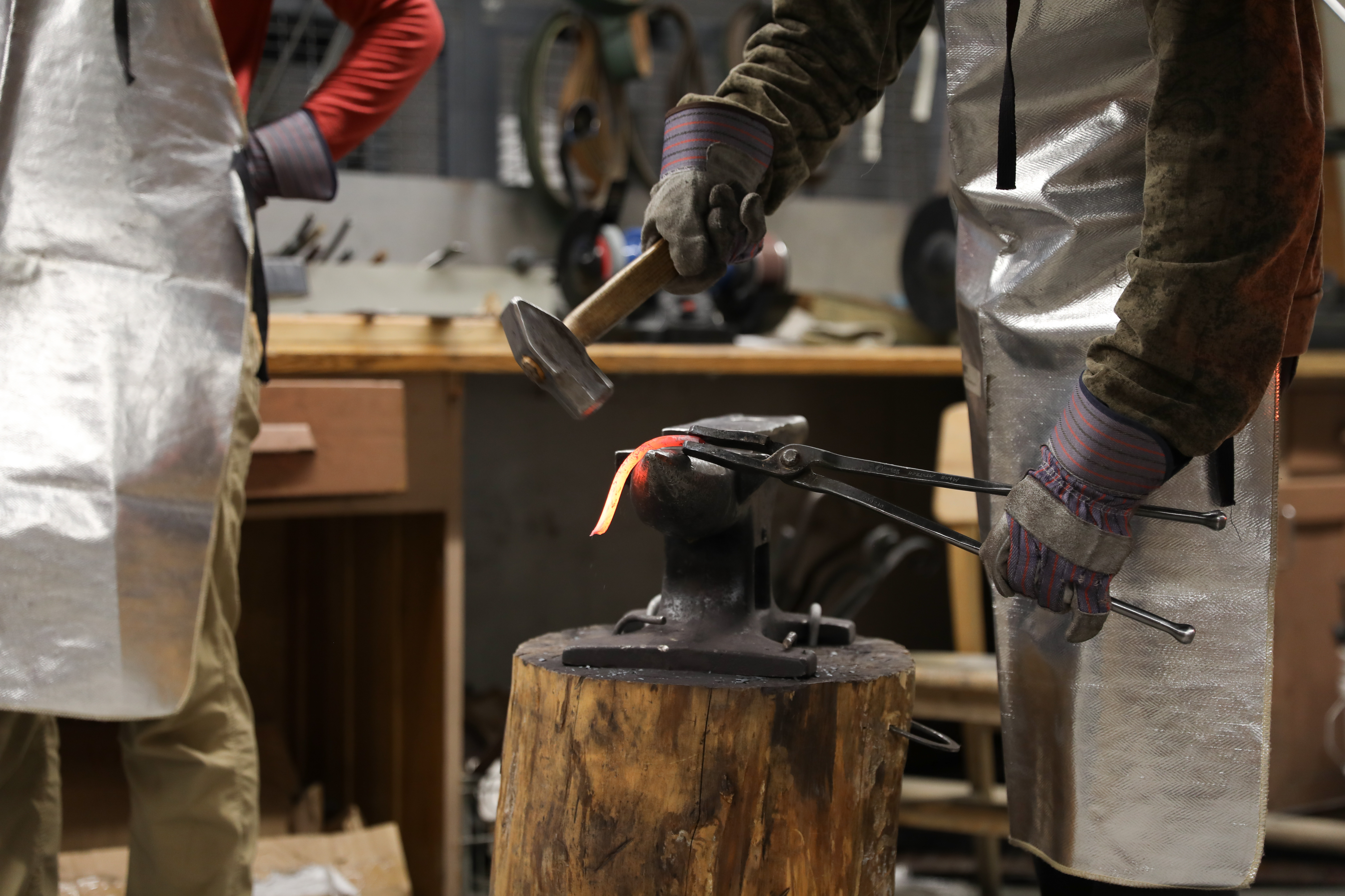 student bending the metal. 