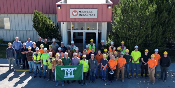 !Interns and workers pose for a photo at Montana Resources, taken from a drone