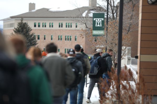 Students walk in the snow at Montana Tech