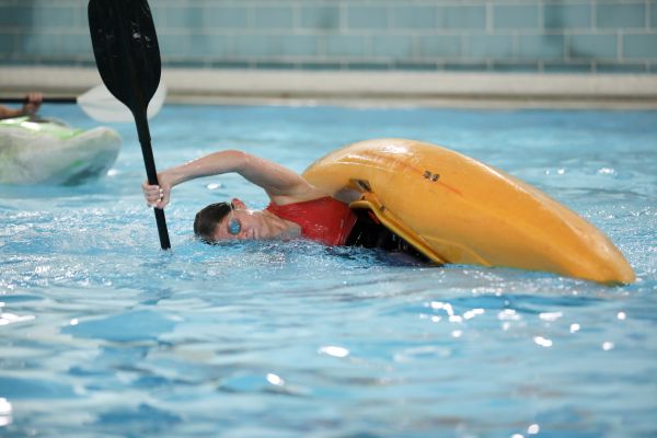 !A student rolls a kayak