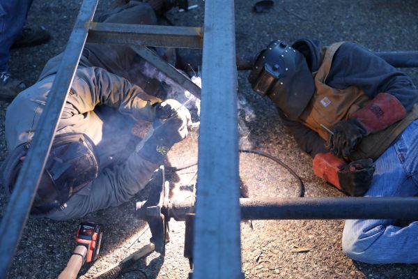Students work on a trailer