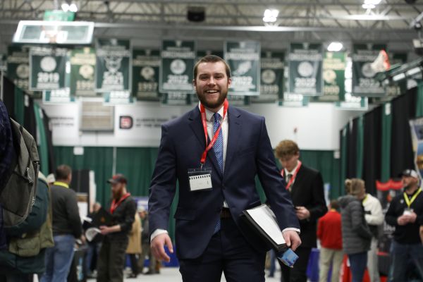 !A student in a suit at Career Fair